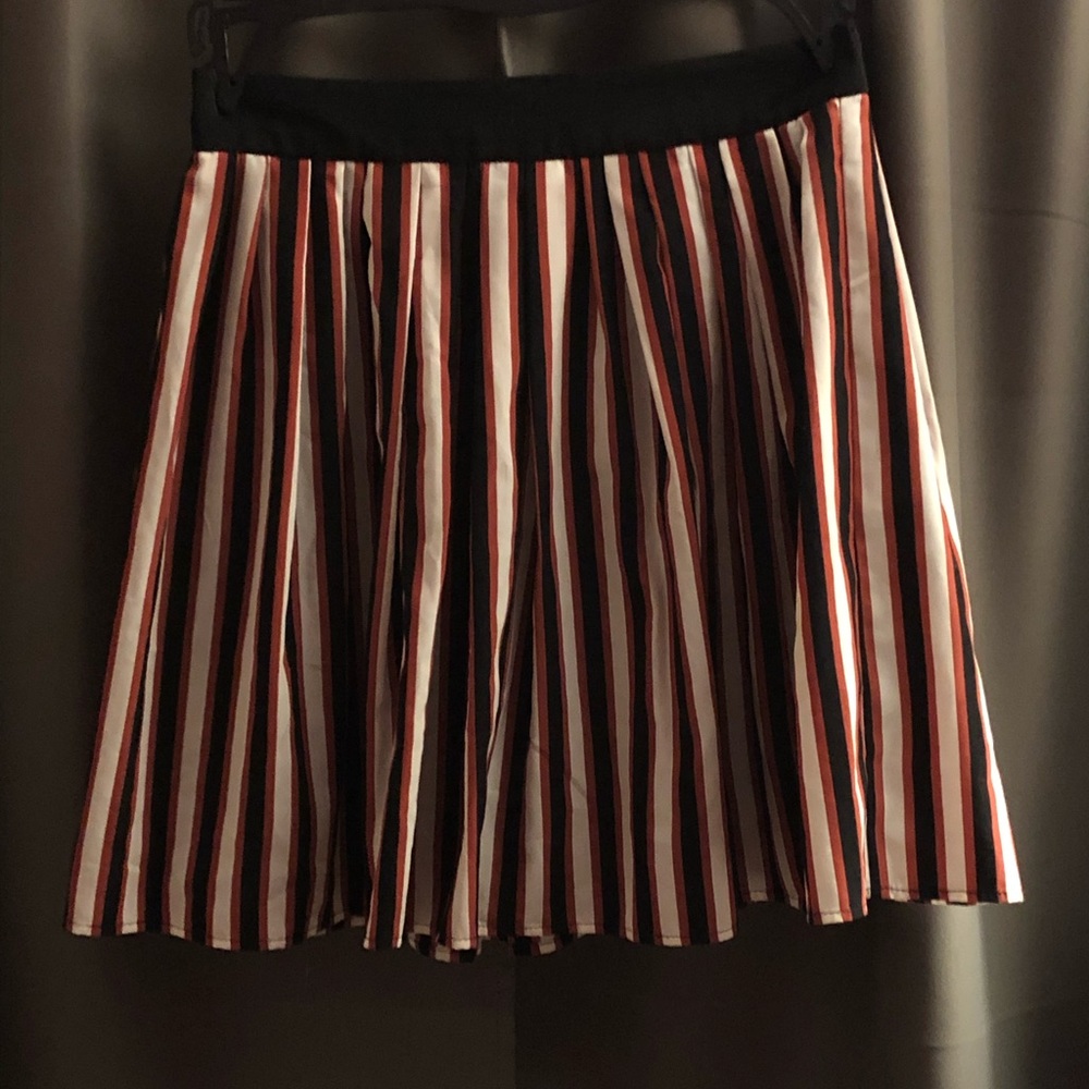 Black, white and currant colored skirt